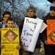 People display signs at Cudell Commons Park in Cleveland Nov. 24, 2014, during a rally for Tamir Rice, a 12-year-old boy shot by police Nov. 22.
JORDAN GONZALEZ/AFP/Getty Images